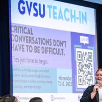 Individual speaking to the student panel